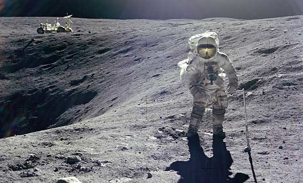 Astronaut Playing Golf On Moon